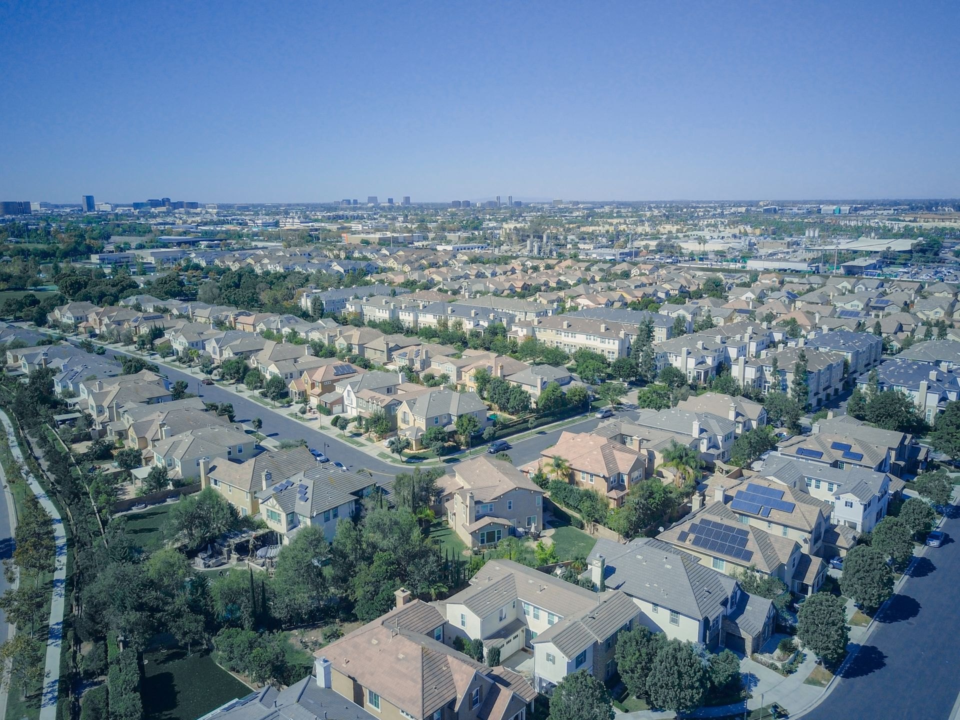 Aerial view of an Inland Empire suburban tract with solar roofs
